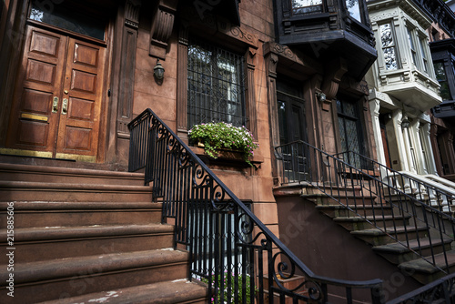 Konstfotografi steps leading up to a brownstone building