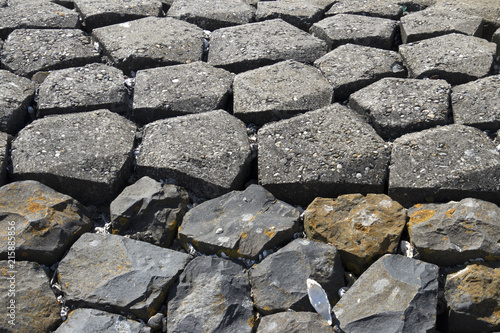 Basalt stones and artificial basalt stones to protect the dike photo