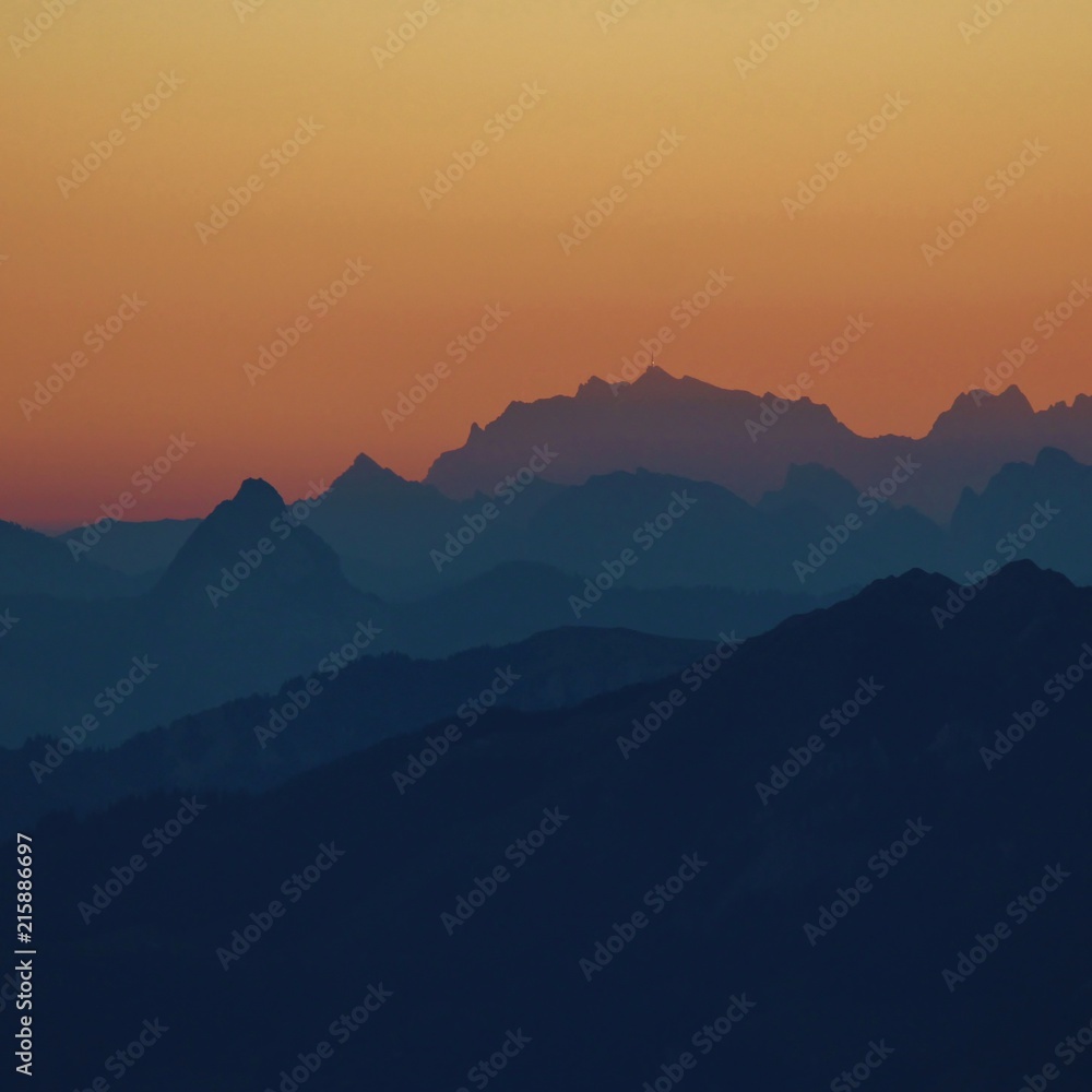 Sunrise view from Mount Brienzer Rothorn, Switzerland. Golden morning sky.