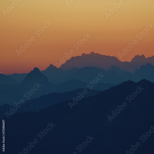 Sunrise view from Mount Brienzer Rothorn, Switzerland. Golden morning sky.