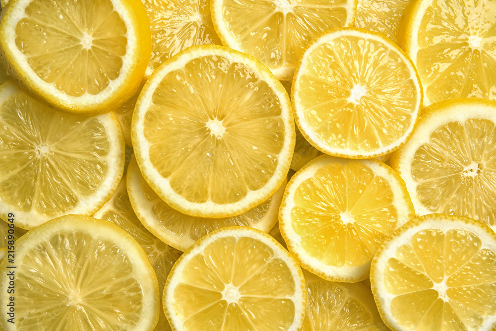 Slices of fresh juicy lemons as background Slices of fresh juicy lemons as background