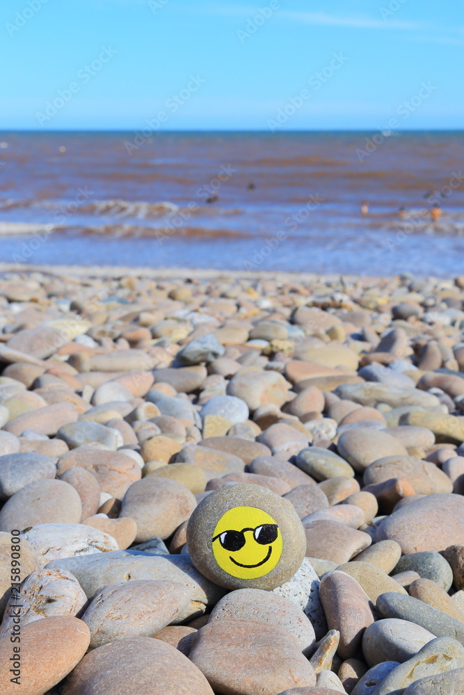 Obraz premium Painted stone on the pebble beach