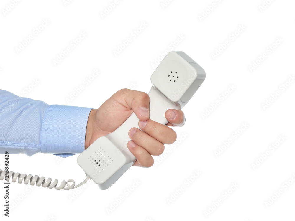 Man holding telephone receiver on white background Man holding telephone receiver on white background