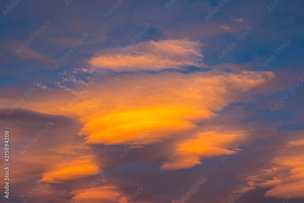The sunset is reflected in the clouds
