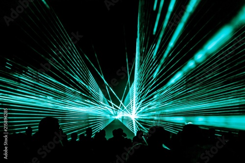Quadro em tela Turquois laser show nightlife club stage with party people crowd
