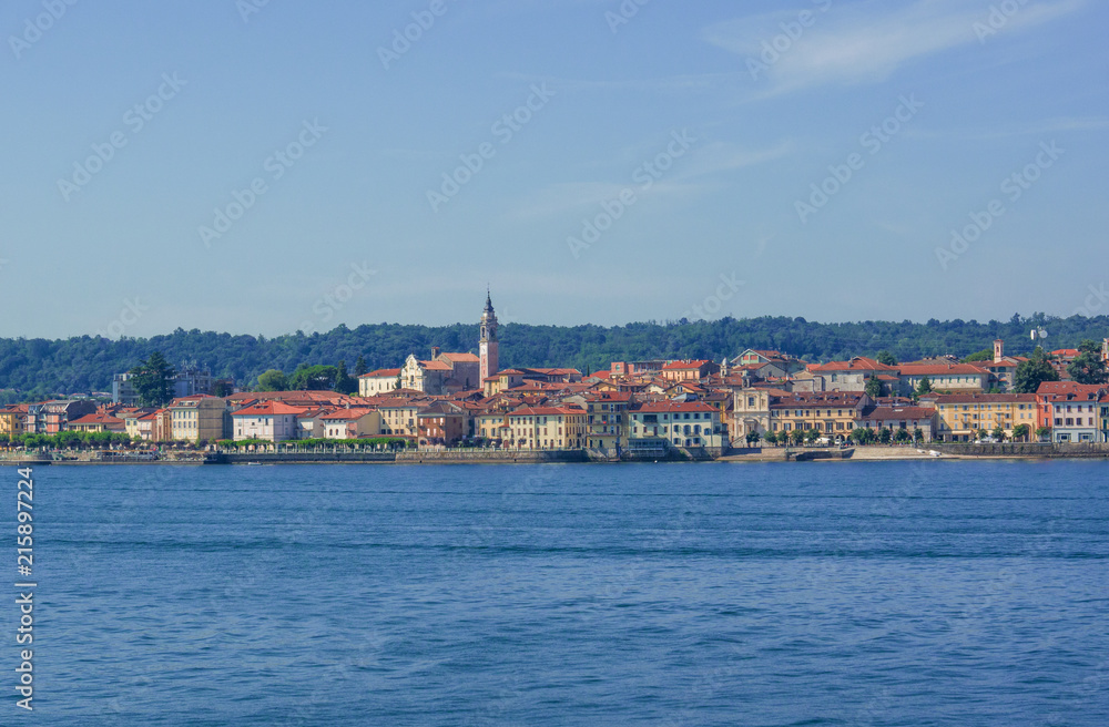colors of the houses of Arona in contrast with the blue of Lake Maggiore.Italia
