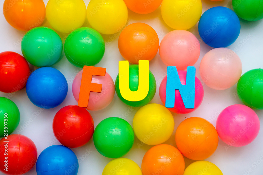 colorful plastic balls on a white background colorful plastic balls on a white background