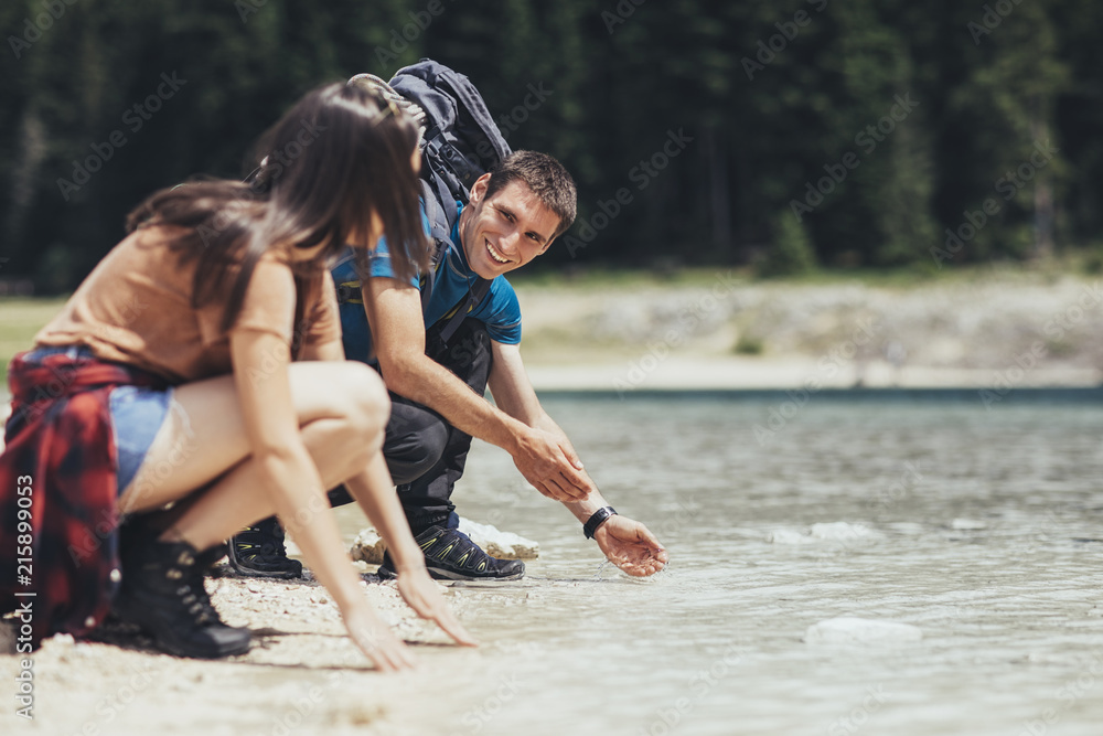 Couple Enjoying By The Lake Couple Enjoying By The Lake