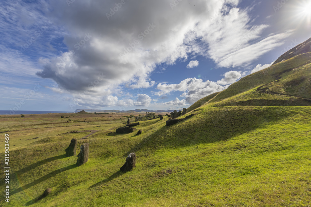 Rano Raraku Volcano, the Moais quarry where all were built on the past, some of them still stay on the quarry waiting to, maybe, one day reach there final destination