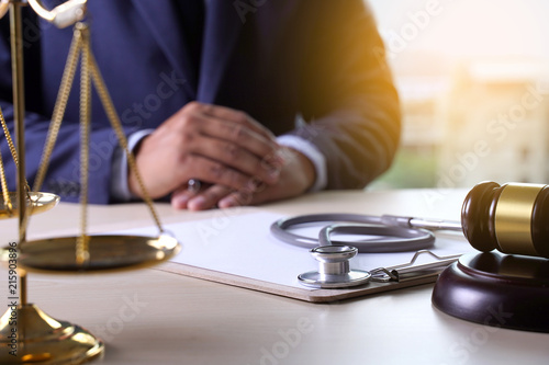 Law gavel stethoscope Health care business rules