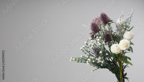 wild and beautiful flower bouquet on light background.