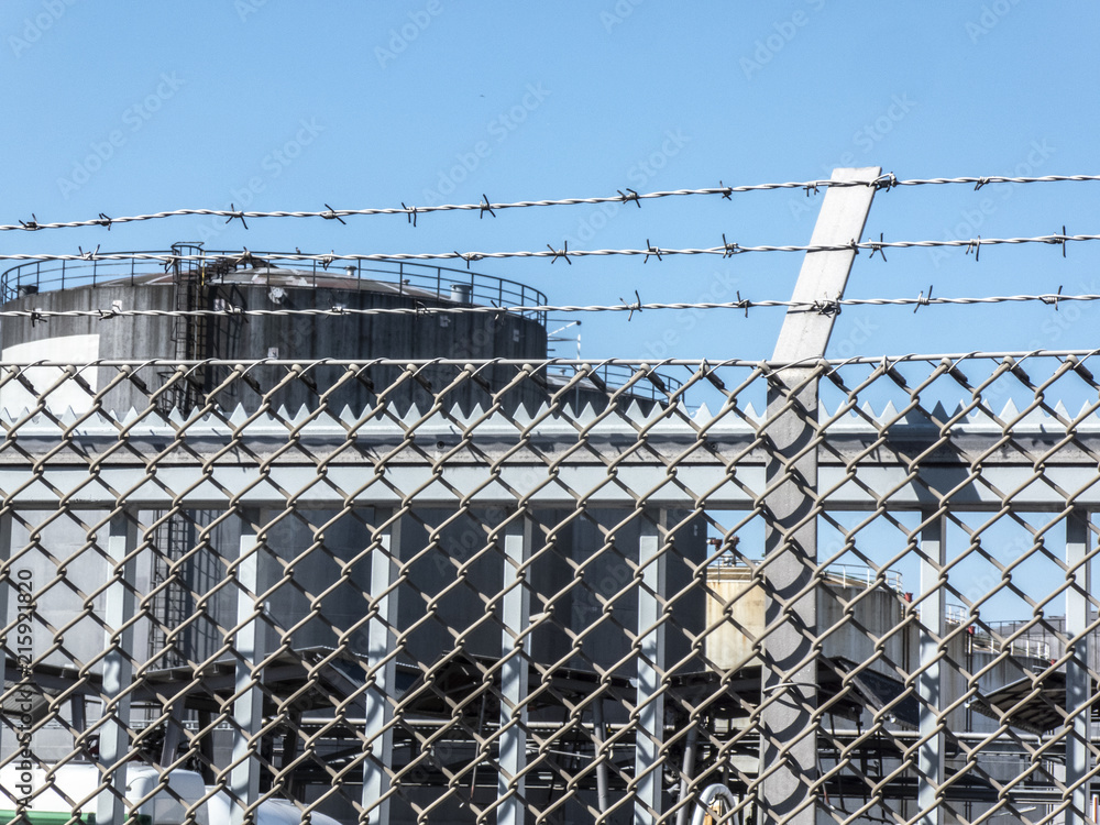 Fence with barbed wire Fence with barbed wire