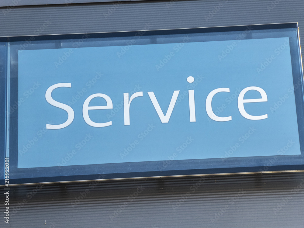 Service written text on a blue signboard Service written text on a blue signboard