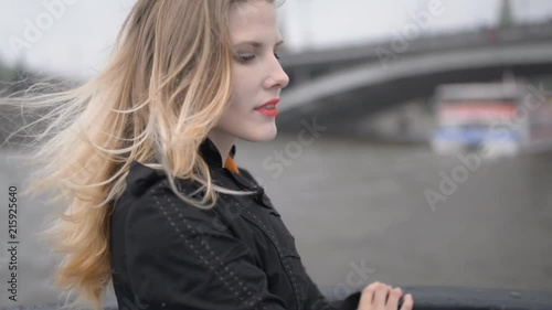 Young woman enjoy a boat tour through Moscow-river. Handheld footage.
