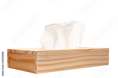 Napkin in the wooden box isolated on white background.