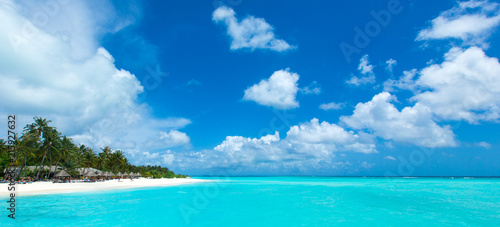 Maldives beach resort panoramic landscape. Summer vacation travel holiday background concept. Maldives paradise beach. © Pakhnyushchyy