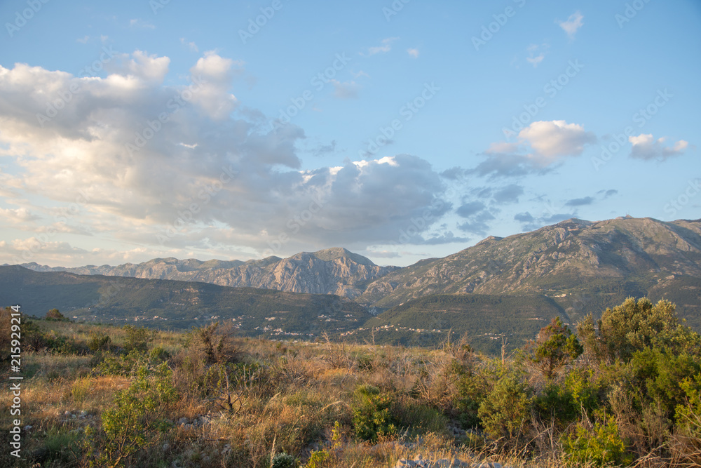 Sunset lights over the sea and mountains