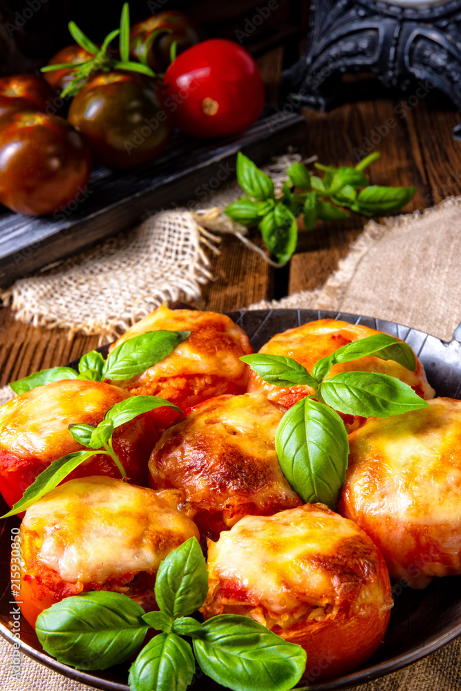 Tomatoes stuffed with rice and cheese from the oven Tomatoes stuffed with rice and cheese from the oven