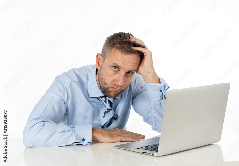 Business, people, deadline and technology concept - stressed entrepreneur businessman with laptop computer at office feeling angry and desperate. Business, people, deadline and technology concept - stressed entrepreneur businessman with laptop computer at office feeling angry and desperate.