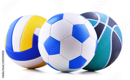 Three sport balls over white background