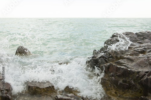 wave and drops at the beach