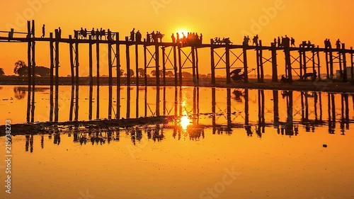 4K Time lapse of U Bein Bridge that is a wooden bridge across Ayeyarwady river in Amarapura where is apart of Mandalay, Myanmar.