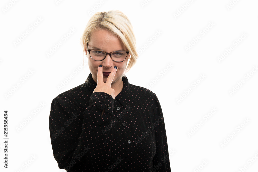 Blonde female teacher wearing glasses showing look into my eyes gesture