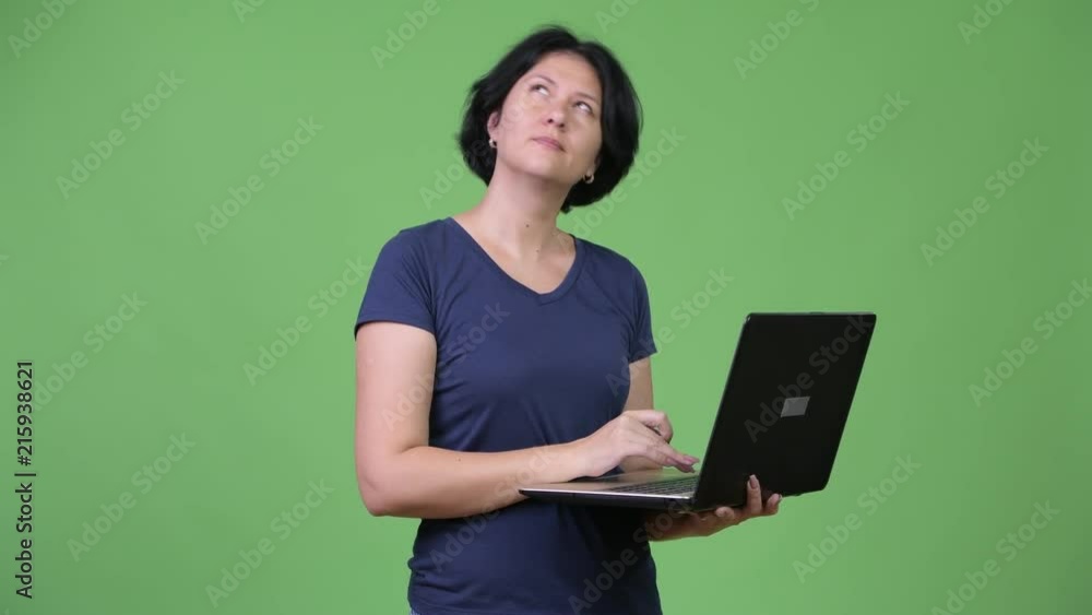 Beautiful woman with short hair using laptop Beautiful woman with short hair using laptop