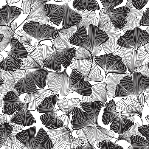 Seamless monochrome floral pattern with leaves of gingo biloba. Vector illustration on white background .