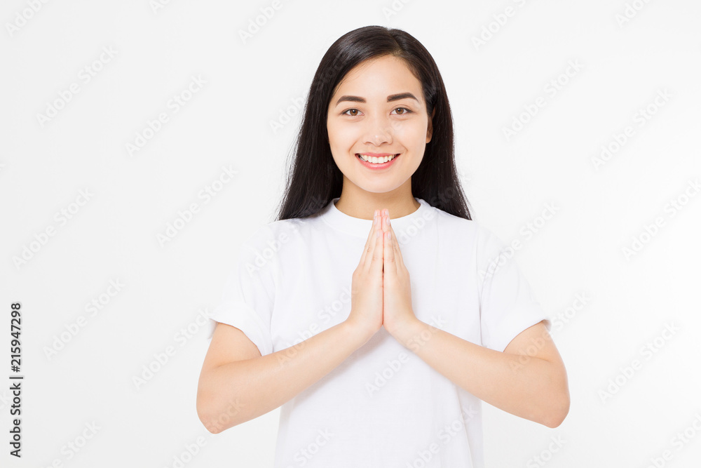 Young asian woman making namaste isolated on white background. Copy space. Young asian woman making namaste isolated on white background. Copy space.