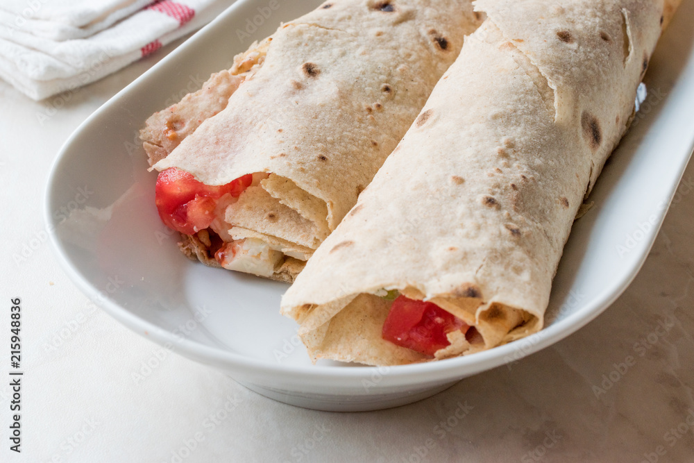 Turkish Fast Food Wrap Gozleme with Tomatoes and Cheese Turkish Fast Food Wrap Gozleme with Tomatoes and Cheese