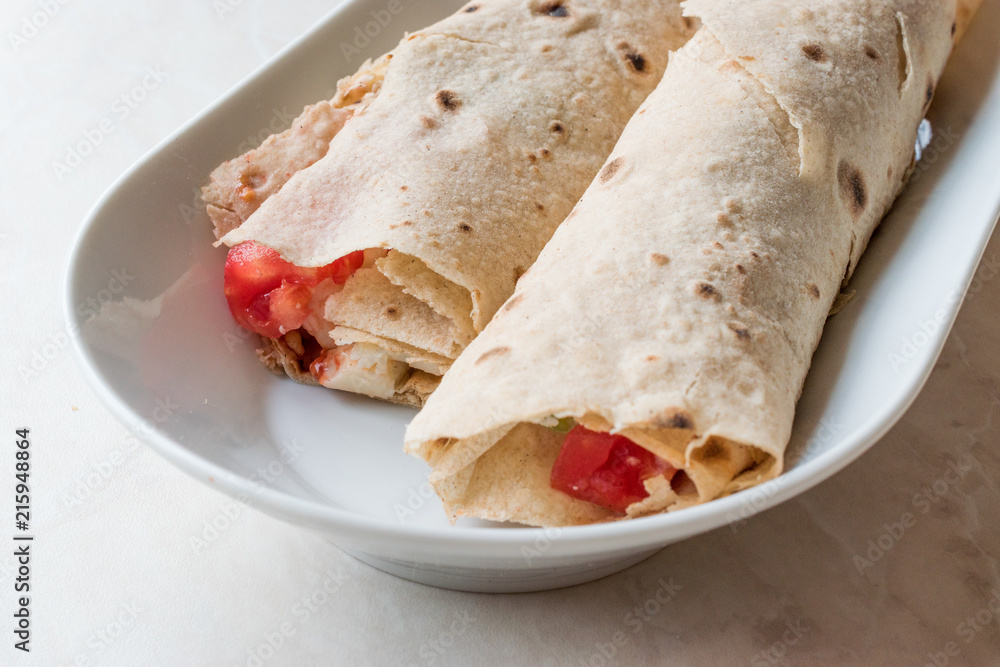 Turkish Fast Food Wrap Gozleme with Tomatoes and Cheese Turkish Fast Food Wrap Gozleme with Tomatoes and Cheese