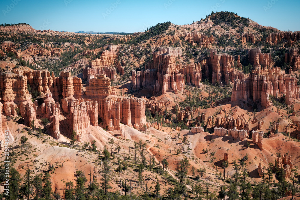 Bryce Canyon landscape with red rock formations and peaks on Fairyland trail, Utah, USA. Bryce Canyon landscape with red rock formations and peaks on Fairyland trail, Utah, USA.