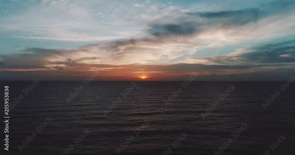 Aerail drone view of beautiful sea over cloudy sunset sky background Aerail drone view of beautiful sea over cloudy sunset sky background