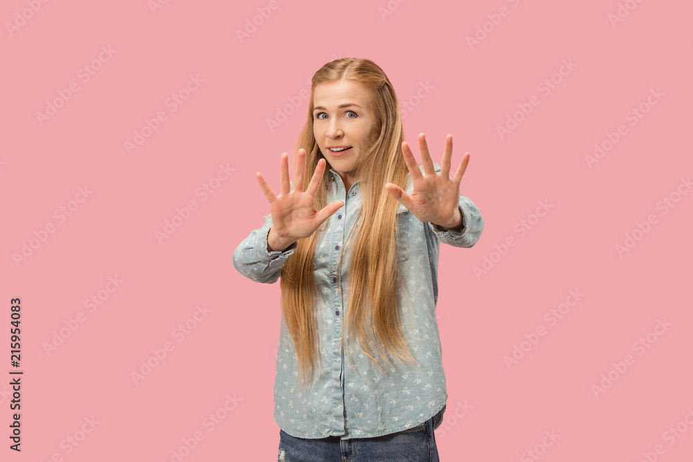 Let me think. Doubtful pensive woman with thoughtful expression making choice against pink background Let me think. Doubtful pensive woman with thoughtful expression making choice against pink background
