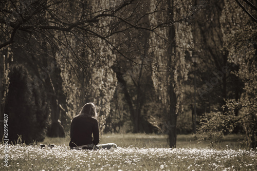 Lonely Sad Young Woman, Back view of female teenager outdoors (unhappy dark sepia effect - image with copy space)