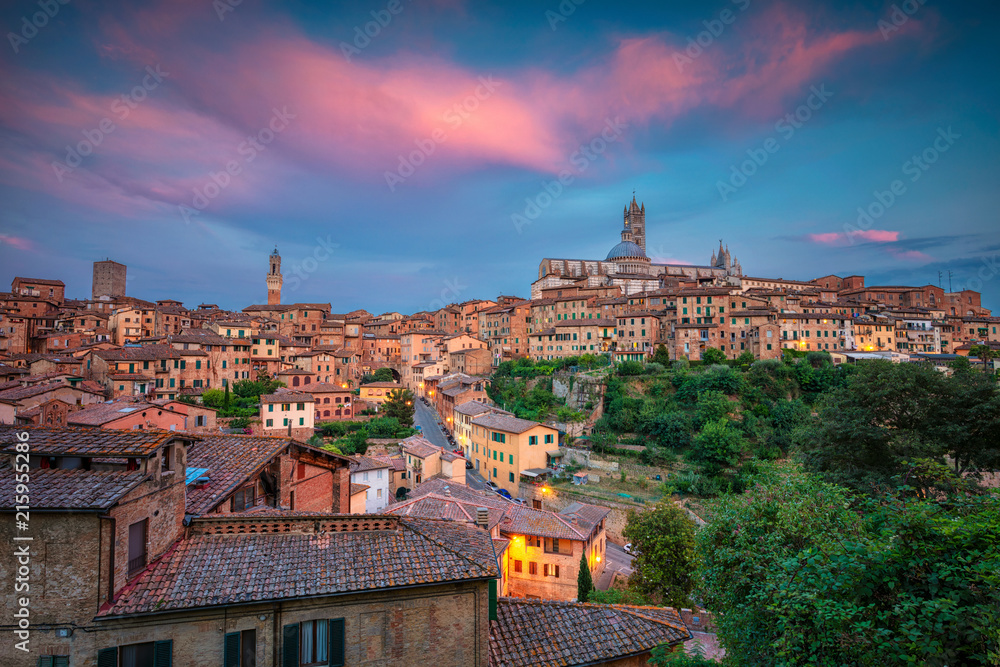 Siena. Cityscape aerial image of medieval city of Siena, Italy during sunset.