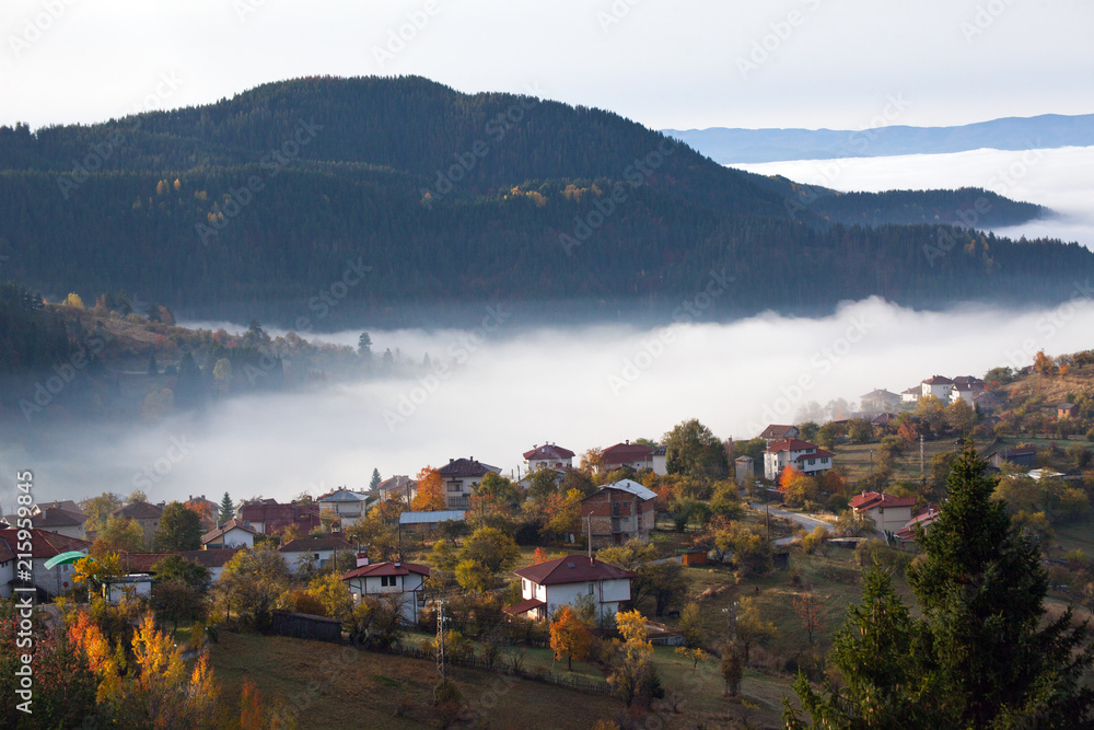 Autumn in the Rhodope Mountains, Bulgaria. Early morning. The mountain is covered with fog.