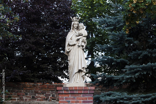 The statue of the Virgin Mary with the crown holding the baby Jesus in her arms in the Sanctuary of the Mother of God, in the Swieta Katarzyna, Lower Silesian Voivodeship
