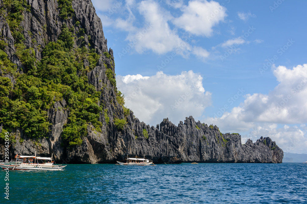 Lagoon surrounded by rocks in El Nido Palawan. Philippine seascape with rocks. Tropical paradise in Asia