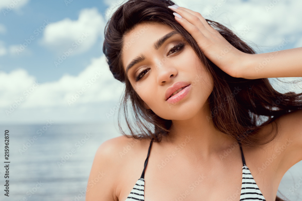 portrait of beautiful brunette girl in swimsuit portrait of beautiful brunette girl in swimsuit