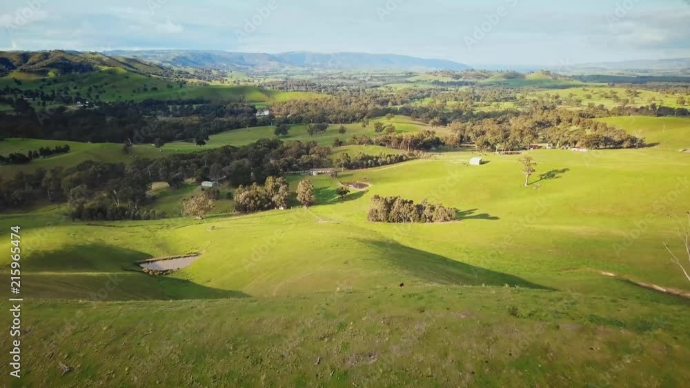 Aerial shot of mountain ranges and farmland Aerial shot of mountain ranges and farmland