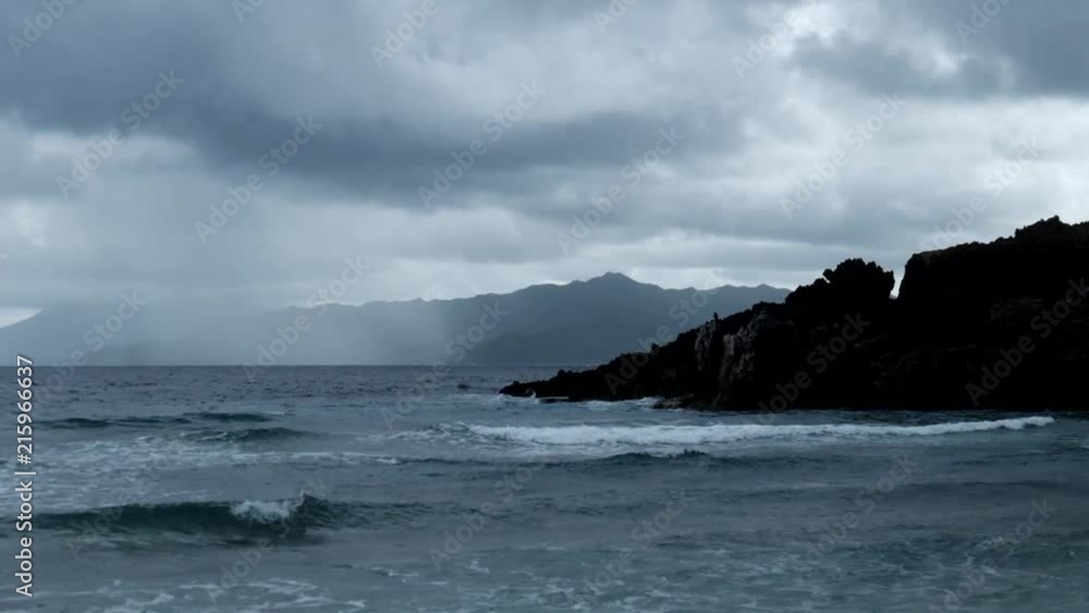 Medium waves near mountains in a gloomy day. Shot in Basco, Batanes.