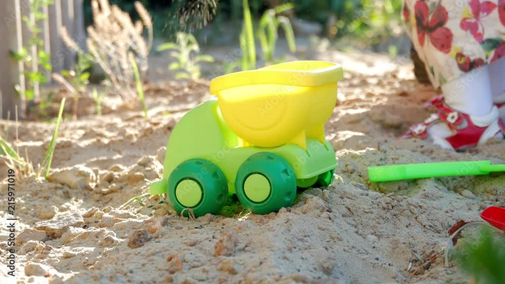 Toy car on the sand for child games. Toy car on the sand for child games.