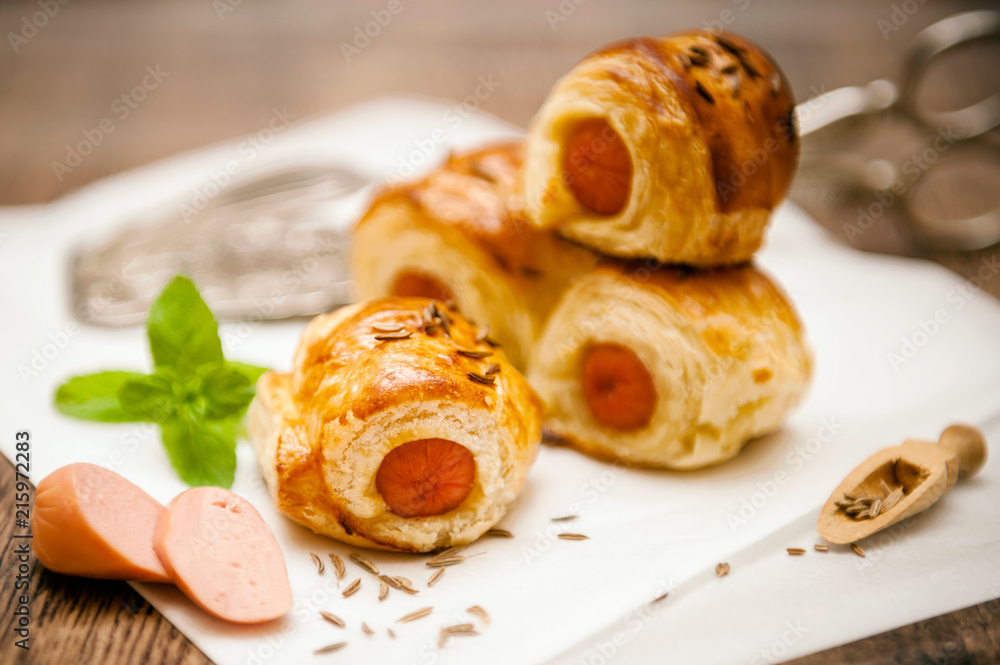 Small sausage rolls baked in pastry Small sausage rolls baked in pastry