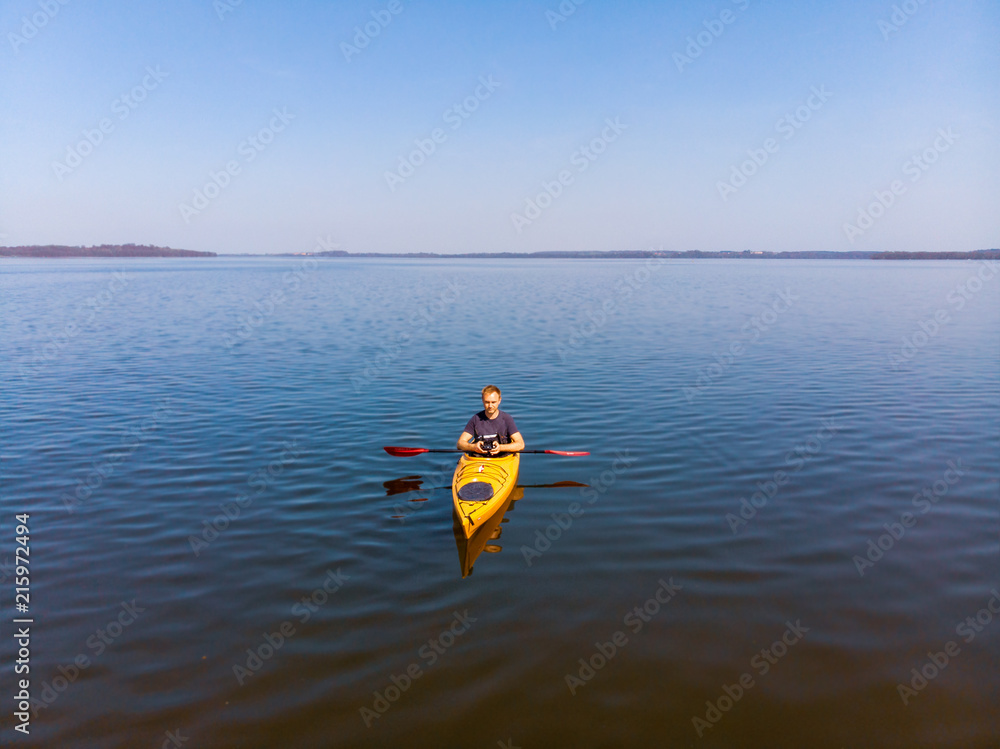 Kayak on a lake, drone view
