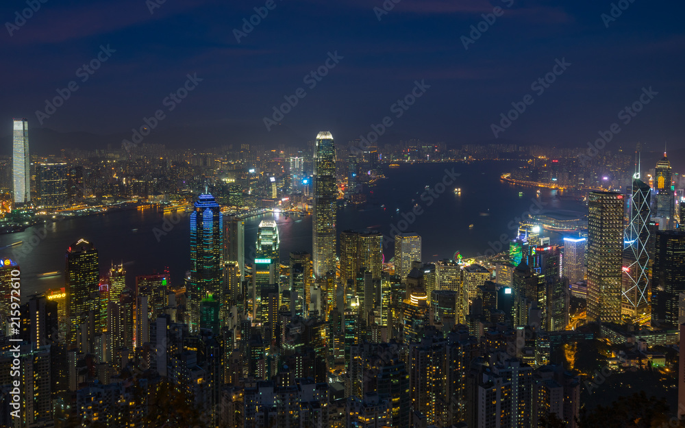 Hong Kong and Victoria Harbour at night viewed from Lugard Road, one of the best spot near Victoria Peak to enjoy the view of the city