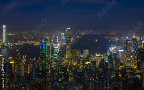 Hong Kong and Victoria Harbour at night viewed from Lugard Road, one of the best spot near Victoria Peak to enjoy the view of the city