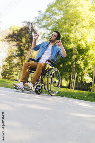 Wallpaper Mural Handicapped man enjoying music Torontodigital.ca