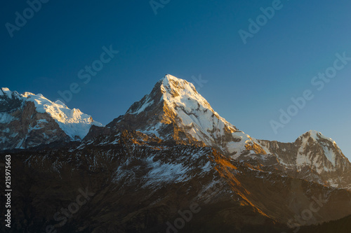 Machapuchhare mountain top in the Himalaya range, seen from Poon Hill tower in Nepal.